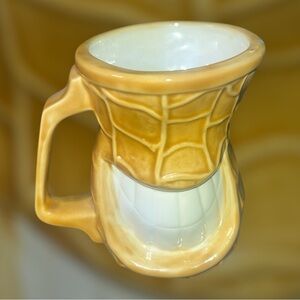Elegant Tan and White Ceramic Mug with Geometric Design